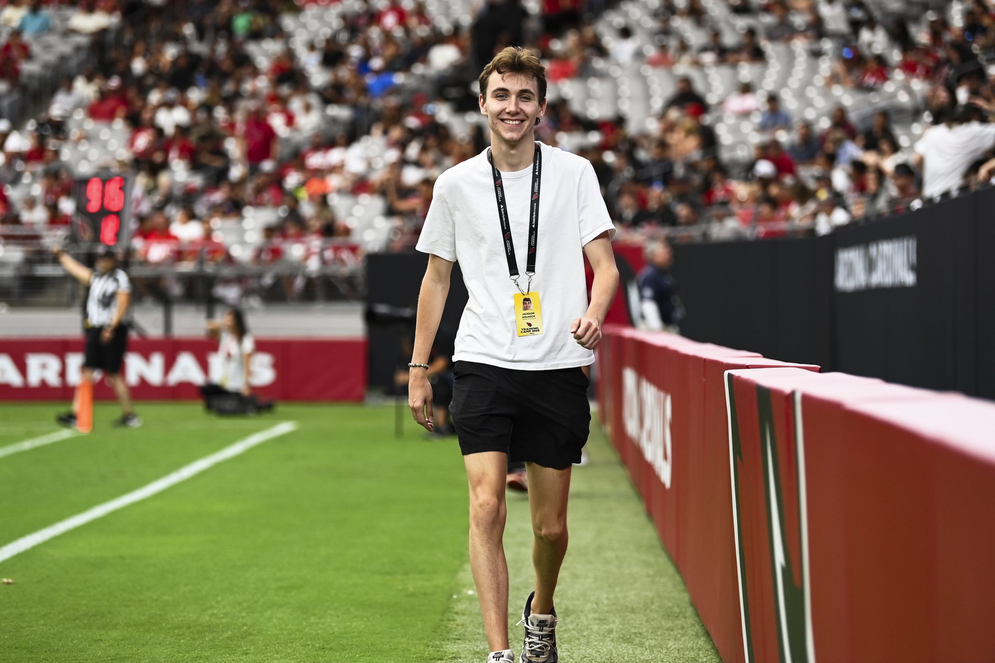 Jackson Adlhoch on the sideline at Arizona Cardinals training camp, State Farm Stadium